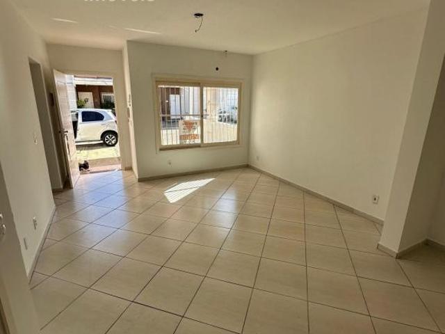 Excelente casa em condomínio, à venda no bairro Novo Mundo Gravataí/RS