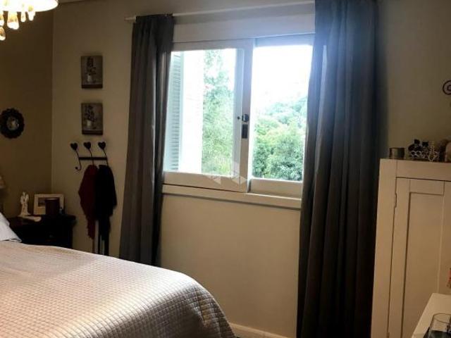Excelente casa na Garibaldina. Composta de 03 dormitórios, sendo 01 suíte