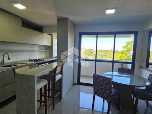 EXCELENTE APARTAMENTO UM DORMITÓRIO COM CLOSET, SUÍTE, CHURRASQUEIRA E BOX