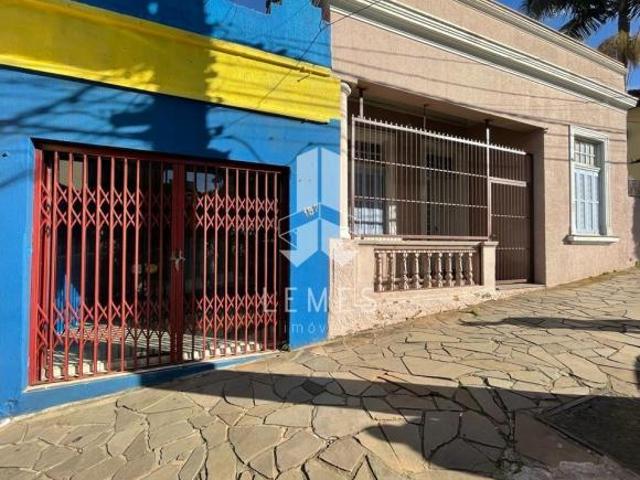 EXCELENTE INVESTIMENTO Casa Comercial com tereno amplo no Centro da Cidade