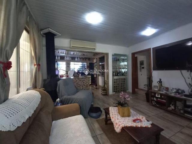 Excelente opção de 2 casas no Parque Sta. Fé / Ruben Berta e terreno de 318 m²