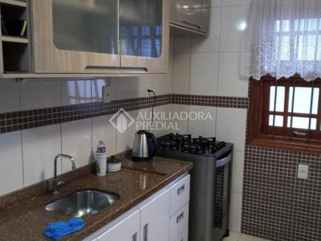 Excelente sobrado de esquina com ótima localização no Bairro Residencial