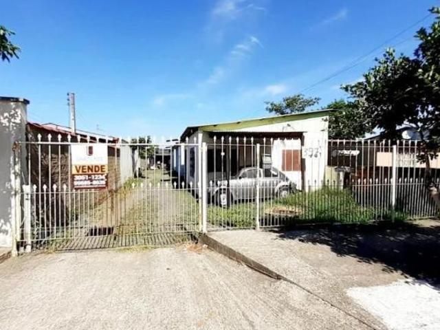 Excelente terreno com 5 casas no pátio para locação