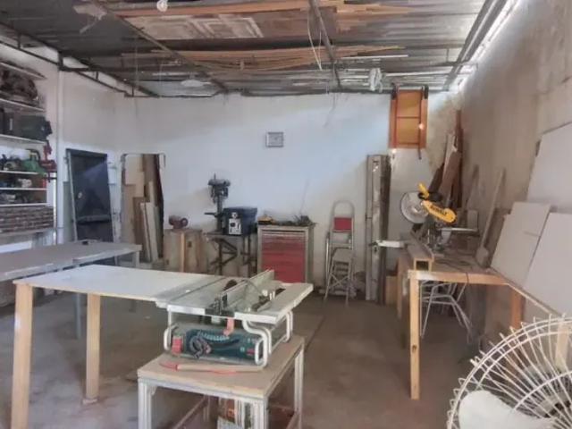 Excelente Terreno com duas casas e um galpão em Curicica