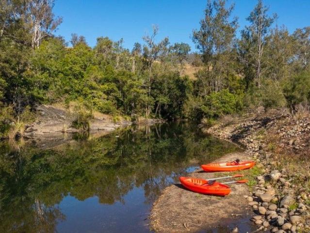 140 ACRES WITH HASTINGS RIVER FRONTAGE