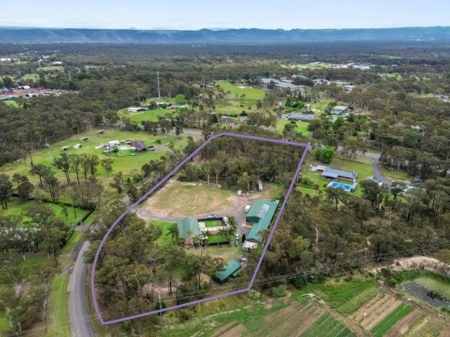Exceptional 5 Acre Lifestyle Property with Expansive Family Home & Impressive Sheds