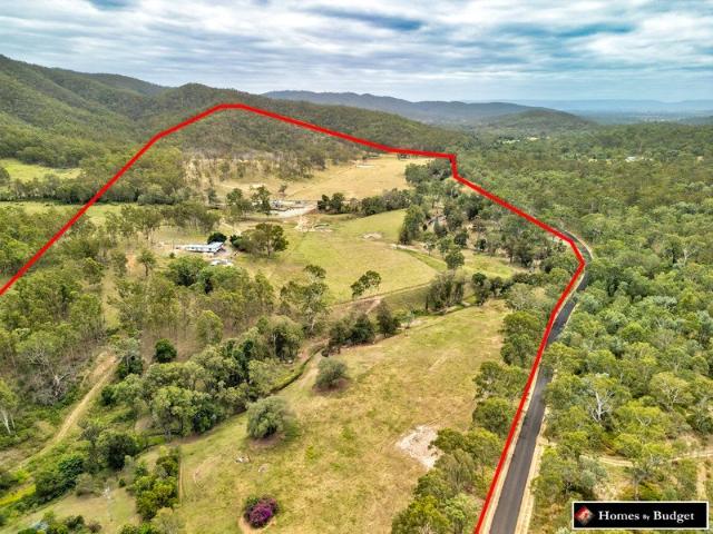 Exceptional 160 Acre Country Retreat with Panoramic Views and Natural Creek