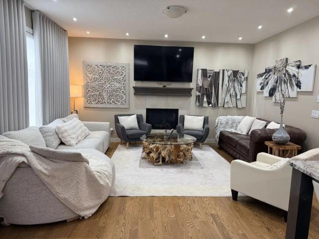 Exceptional 3,560+ Sq. Ft. Home + Legal Suite | 5 Bedrooms + Den | 4.5 Baths |