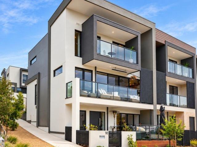 Exceptional Three Level Townhome in Prestigious Martha Cove