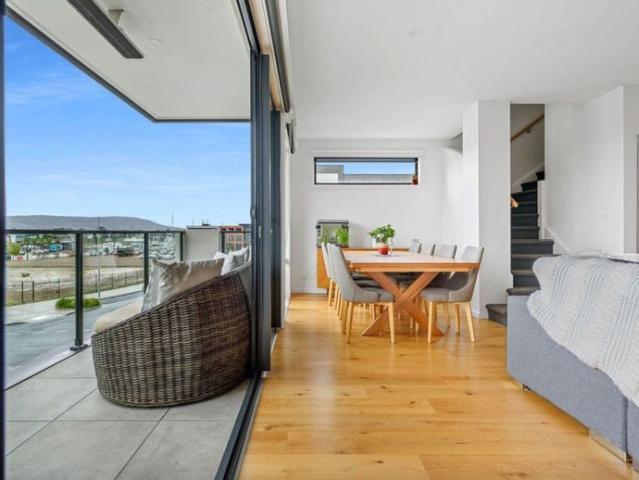 Exceptional Three Level Townhome in Prestigious Martha Cove