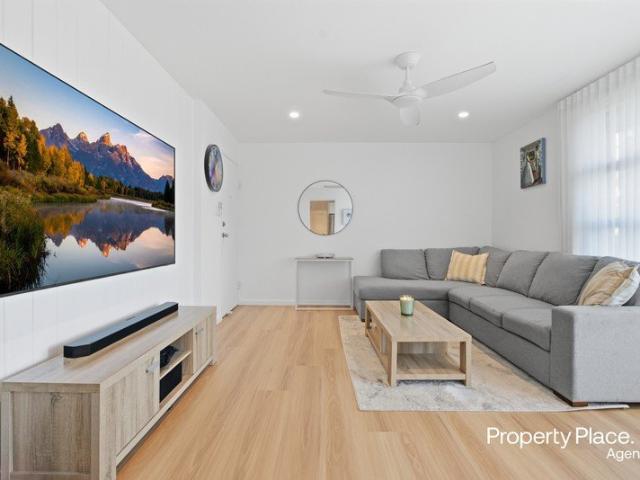 Exceptional Top Floor Apartment in Ideal Locale