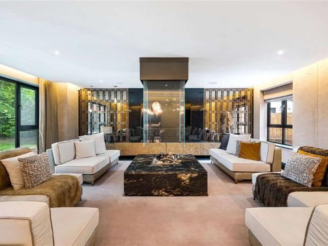 Exceptional turnkey residence offering over 6,000 sq ft of luxurious accommodation, complete with cinema room, gym, sauna and games suite, in the heart of Hale Barn