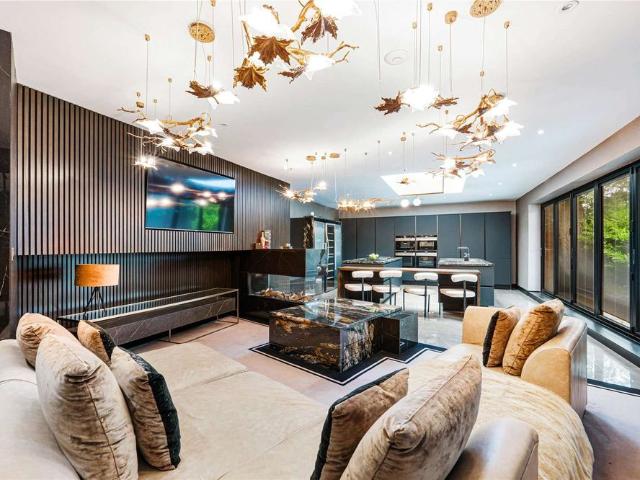Exceptional turnkey residence offering over 6,000 sq ft of luxurious accommodation, complete with cinema room, gym, sauna and games suite, in the heart of Hale Barn