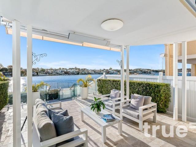 EXCEPTIONAL WATERFRONT WITHIN EXCLUSIVE CAPE CABARITA = MARINA BERTH INCLUDED