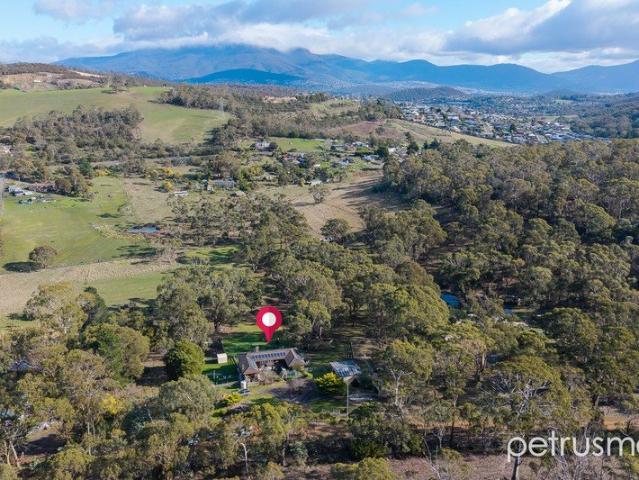 Exceptional acreage living, just minutes from the city