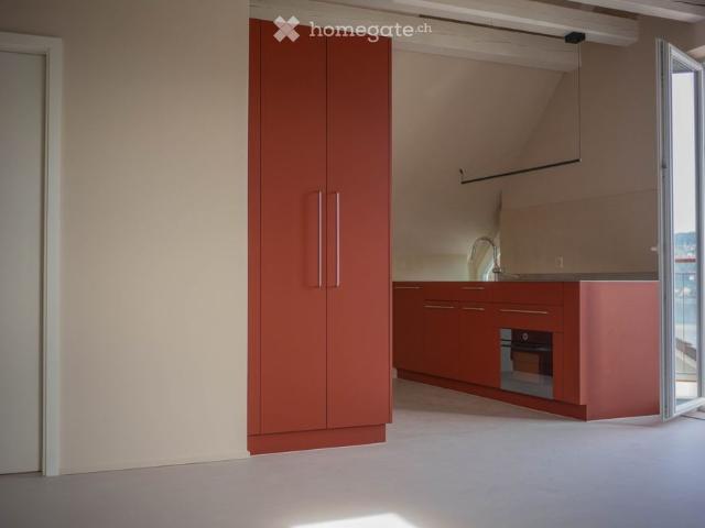 Exceptional Attic Apartment in Thalwil with 180° Views of Lake Zurich and the Alps