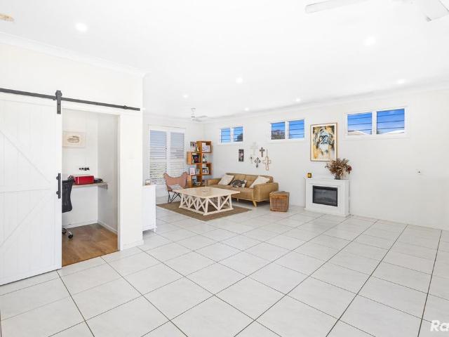 Exceptional Coastal Living with Stunning Causeway Lake Views!
