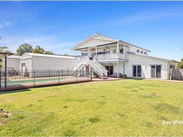 Exceptional Coastal Living with Stunning Causeway Lake Views!