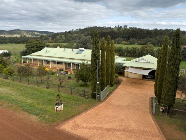 Exceptional Country Living on 54 Acres of Privacy & Views