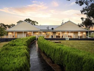 Exceptional Country Retreat with Expansive Homestead Appeal