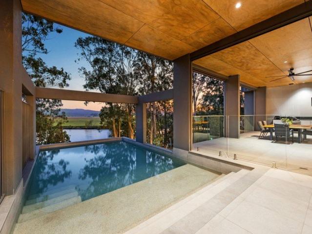 Exceptional Design with Remarkable Riverfront Living