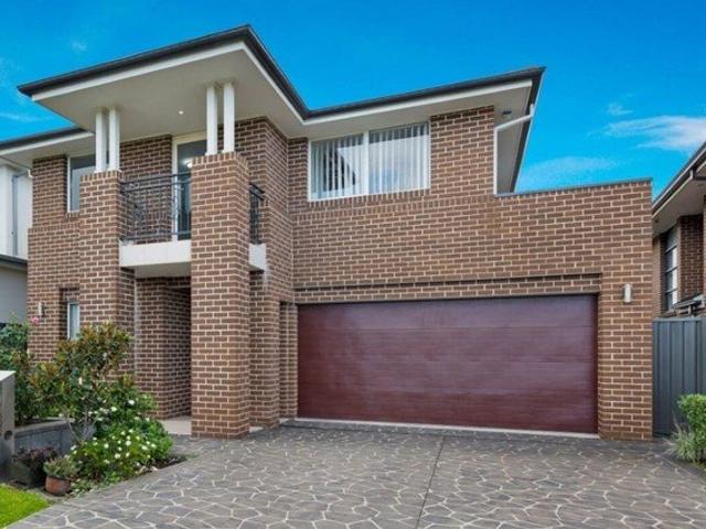 EXCEPTIONAL,DOUBLE STORY FAMILY HOME ON LARGE BLOCK