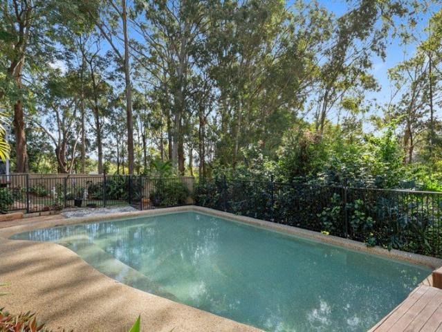Exceptional Dual Living Opportunity with Pool, Side Access & Parkland Outlook