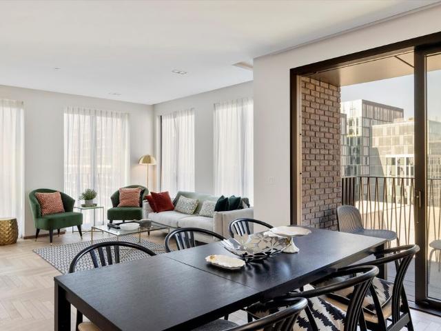 Exceptional three bedroom apartment with a private balcony and expansive open plan living space