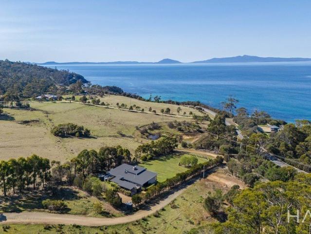 Exceptional East Coast Living with Breathtaking Coastal Views