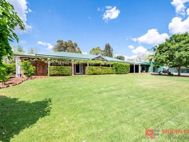 Edge of Town Lifestyle Property with Quality Infrastructure for Work, Horses & Extended Family!