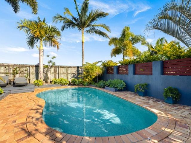 EXCEPTIONAL FAMILY OASIS IN A PRIME LOCATION FEATURING DEDICATED SIDE ACCESS, SALTWATER POOL AND VERSATILE LIVING!