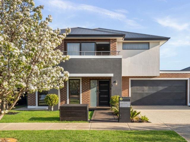 Exceptional Family Living Overlooking Parkland
