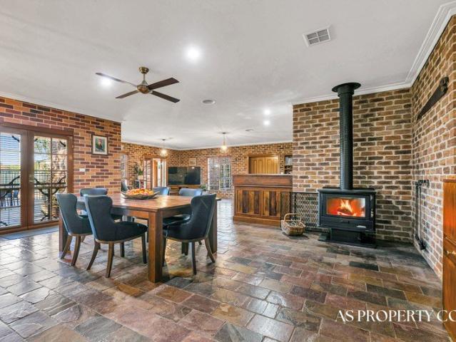 Exceptional Family Living Across 2 Acres