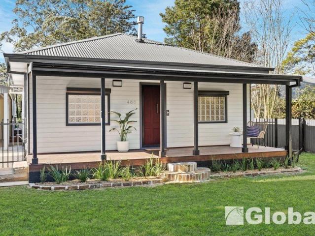 Exceptional Family Living with Unmatched Garaging & Secure Gated Entry