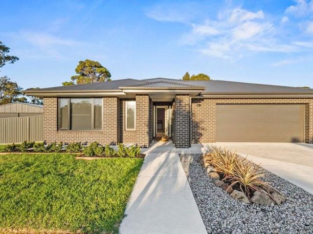 Exceptional Family Residence with Additional Shedding