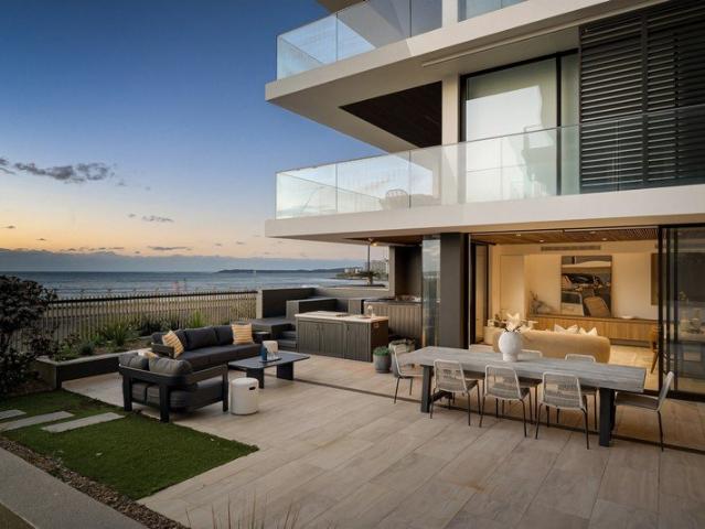 Exceptional ground floor oceanfront apartment with over sized yard in exclusive 'Saltaire'