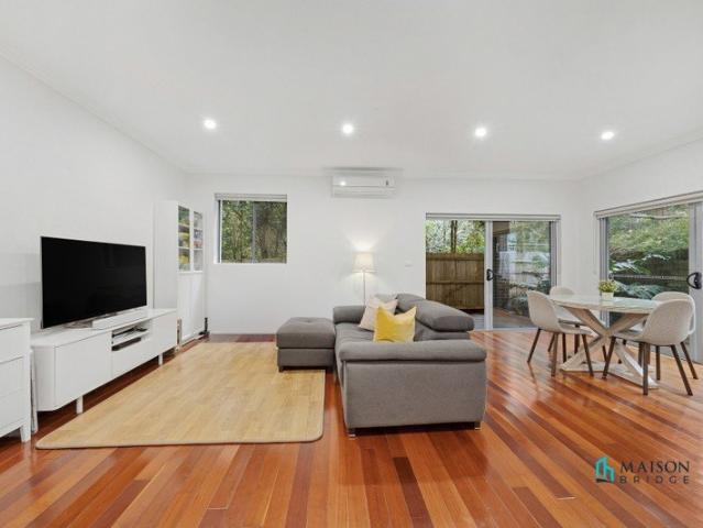 Exceptional Ground Floor Unit with Large Deck, Serene and Private Setting