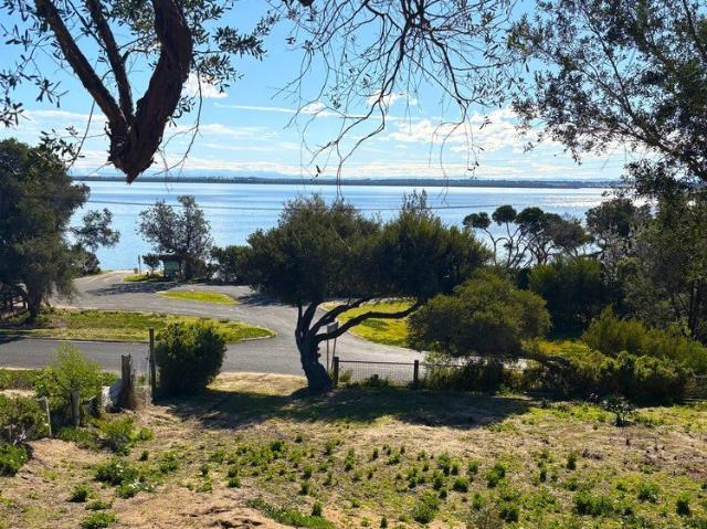 EXCEPTIONAL LAKE AND MOUNTAIN VIEWS WITH DIRECT WATER ACCESS!