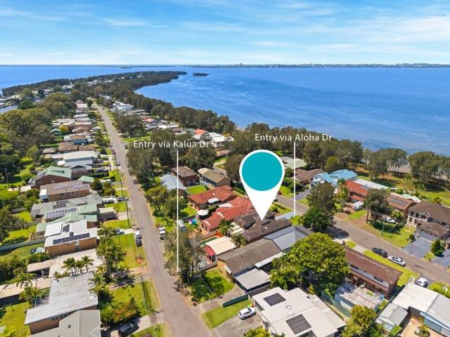 Exceptional Lakeside Living with Dual Access & Self Contained Retreat