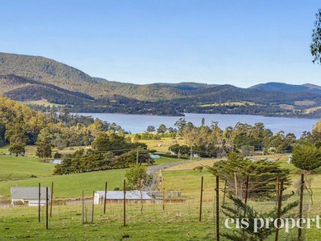 Exceptional Lifestyle Acreage with Stunning Water Views!