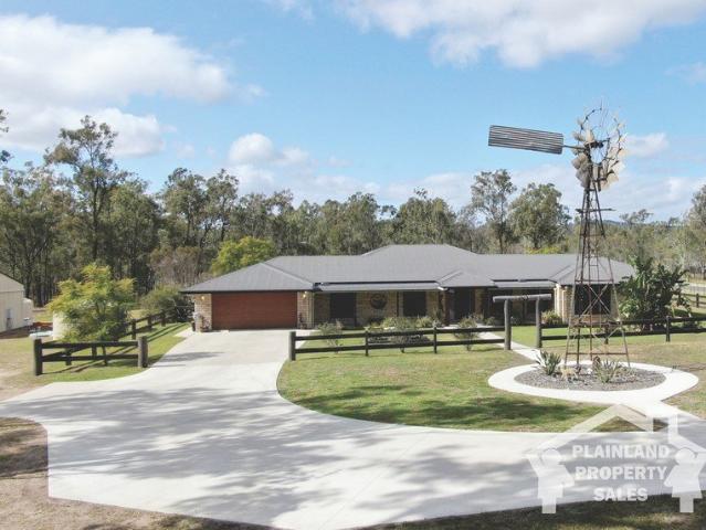 Exceptional Lifestyle Acreage Premium Family Living on Approximately 22 Acres