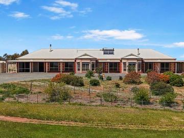 Exceptional Lifestyle Retreat on Over 100 Acres