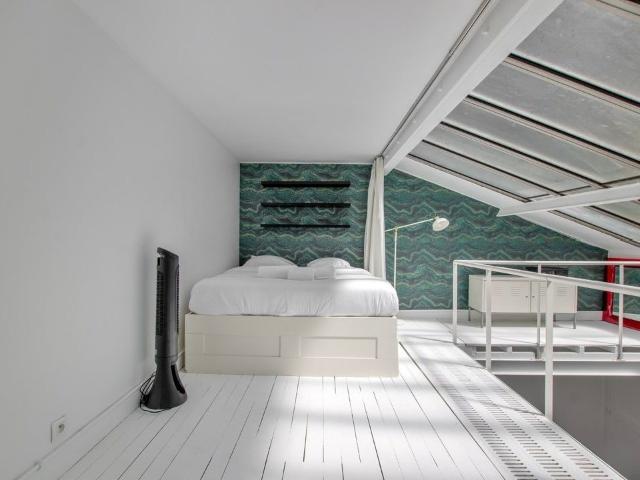 Exceptional Loft in the Heart of Pigalle – Former Artist’s Studio, Paris Amsterdam Apartments for Rent