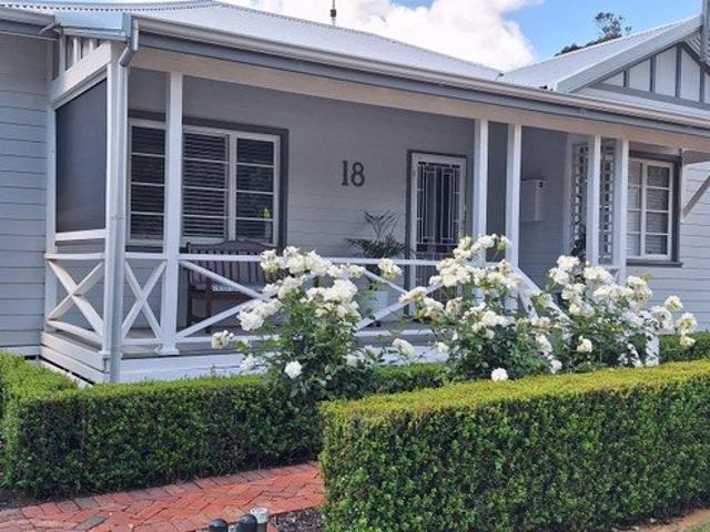Exceptional mid century fully renovated home with landscaped gardens & big shed