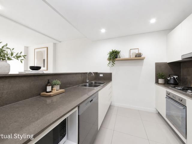 Exceptional Open Plan One Bedroom Unit with Study Featuring a Spacious Paved Courtyard