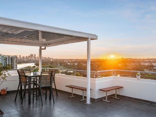 Exceptional Penthouse with a Private Rooftop Terrace & Spectacular Views