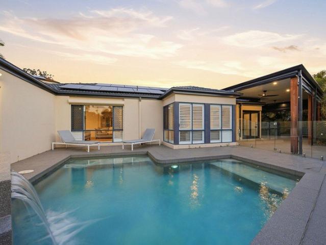 EXCEPTIONAL QUALITY, DESIGNER LIVING AND A PEACEFUL ARUNDEL HILLS LIFESTYLE MUST BE SOLD!