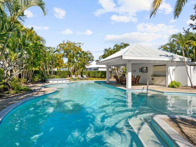 Exceptional Resort Style Living in a Prestigious Royal Pines Villa