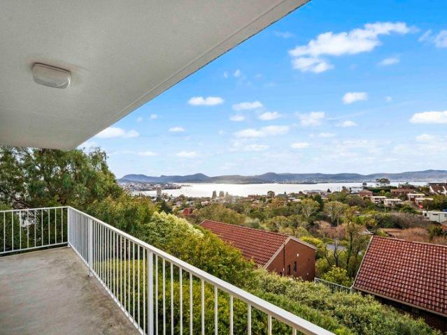 Exceptional River Views & Flexible Living in a Prime Sandy Bay Location