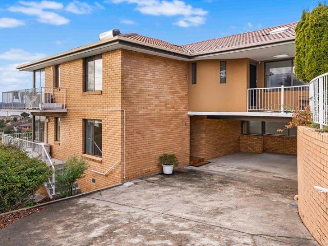 Exceptional River Views & Flexible Living in a Prime Sandy Bay Location
